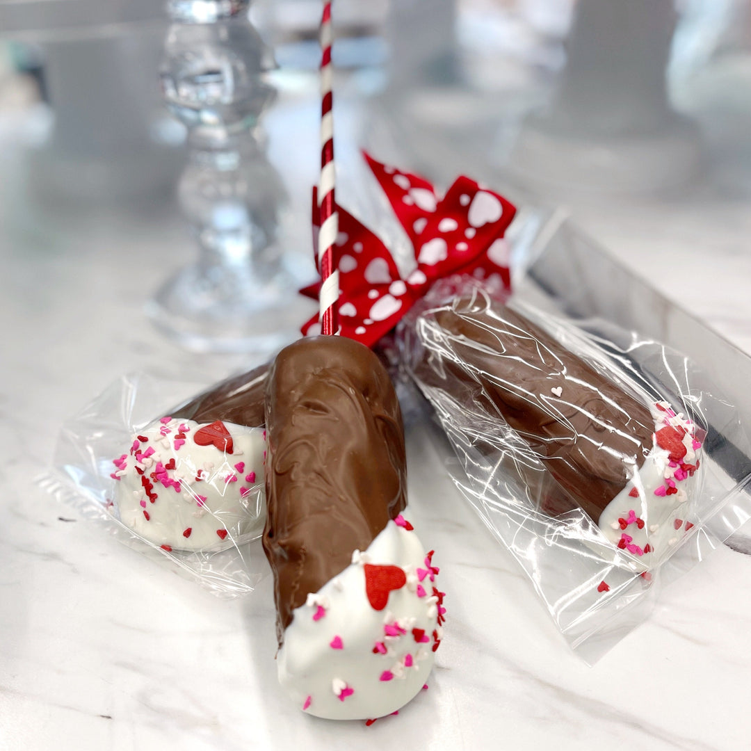 Milk chocolate covered Twinkies with seasonal decorations. 
