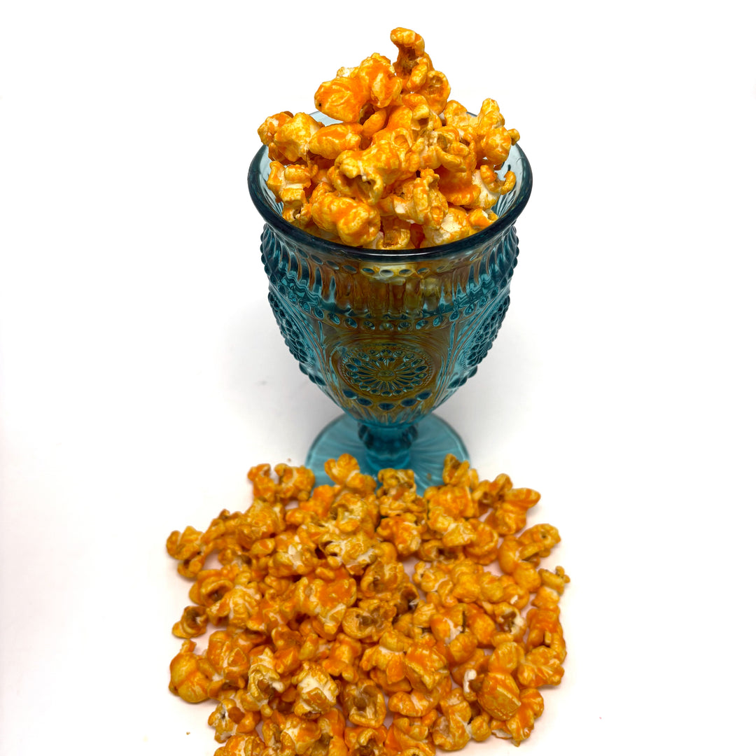 Our Better Cheddar popcorn is generously coated with a rich, creamy cheese blend that captures the essence of the Midwest. 
