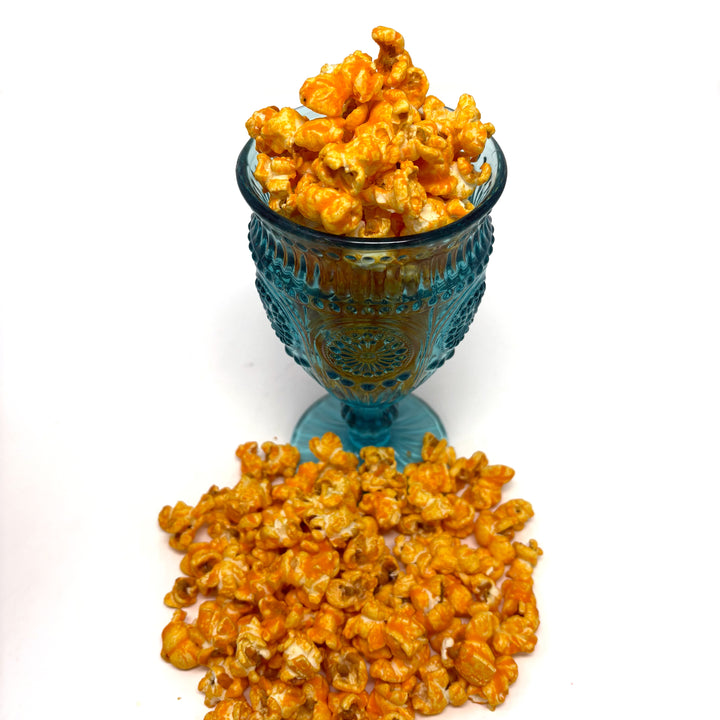 Our Better Cheddar popcorn is generously coated with a rich, creamy cheese blend that captures the essence of the Midwest. 