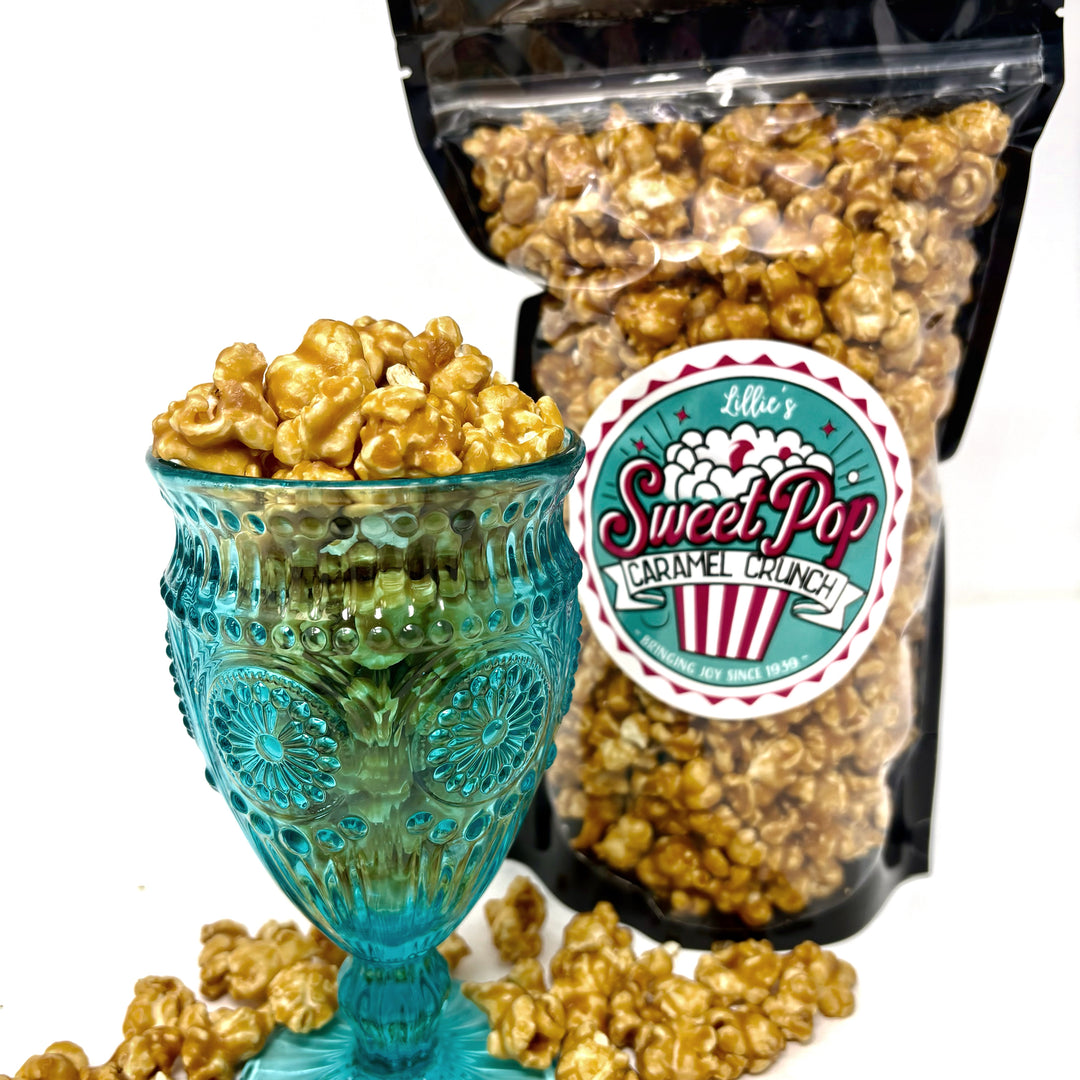 Our deliciously buttery Caramel Crunch popcorn. Made in small-batches of perfection!