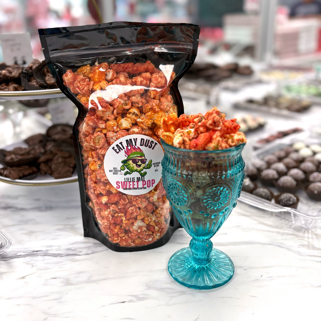Our Eat My Dust Dill Popcorn starts with a blend of White Cheddar and Better Cheddar popcorn, then we turn up the heat with the punchy, tangy kick of dill Hot Cheetos flavor. Finished off with a dusting of Dill Hot Cheetos and sprinkled with whole Dill Hot Cheetos for that extra flavor kick!