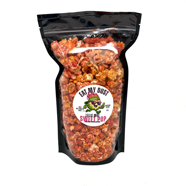 Our Eat My Dust Dill Popcorn starts with a blend of White Cheddar and Better Cheddar popcorn, then we turn up the heat with the punchy, tangy kick of dill Hot Cheetos flavor. Finished off with a dusting of Dill Hot Cheetos and sprinkled with whole Dill Hot Cheetos for that extra flavor kick!