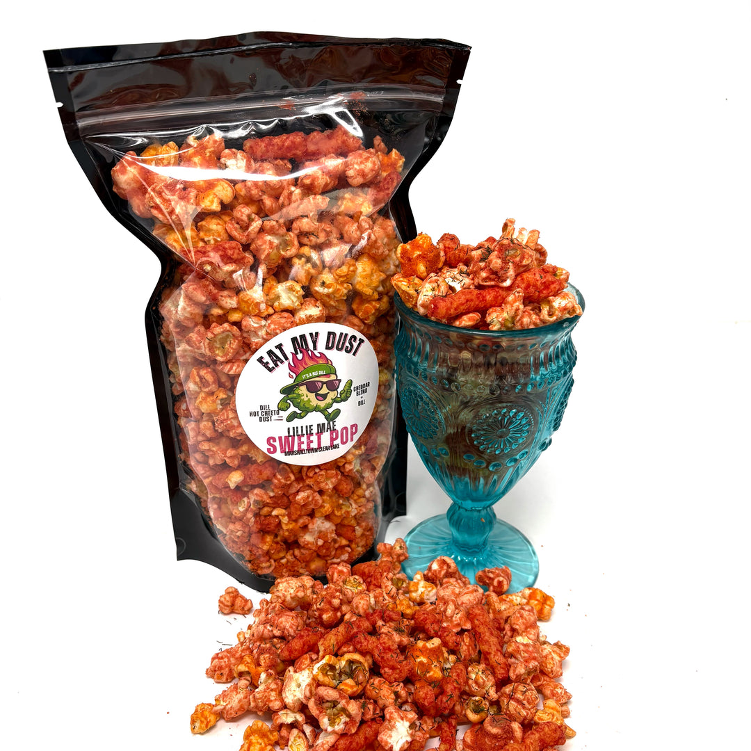 Our Eat My Dust Dill Popcorn starts with a blend of White Cheddar and Better Cheddar popcorn, then we turn up the heat with the punchy, tangy kick of dill Hot Cheetos flavor. Finished off with a dusting of Dill Hot Cheetos and sprinkled with whole Dill Hot Cheetos for that extra flavor kick!