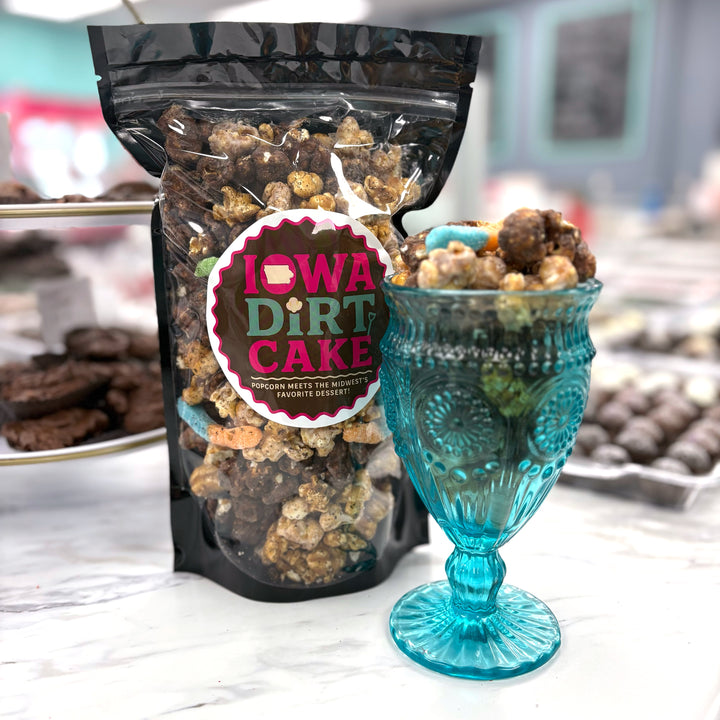 Our Iowa Dirt Cake Popcorn with chocolate caramel popcorn, cream cheese popcorn, and salted caramel popcorn.