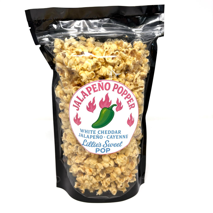Our Jalapeño Popper Popcorn is an addicting blend of our cheesy white cheddar popcorn with an addition of jalapeño heat and zesty cayenne. 