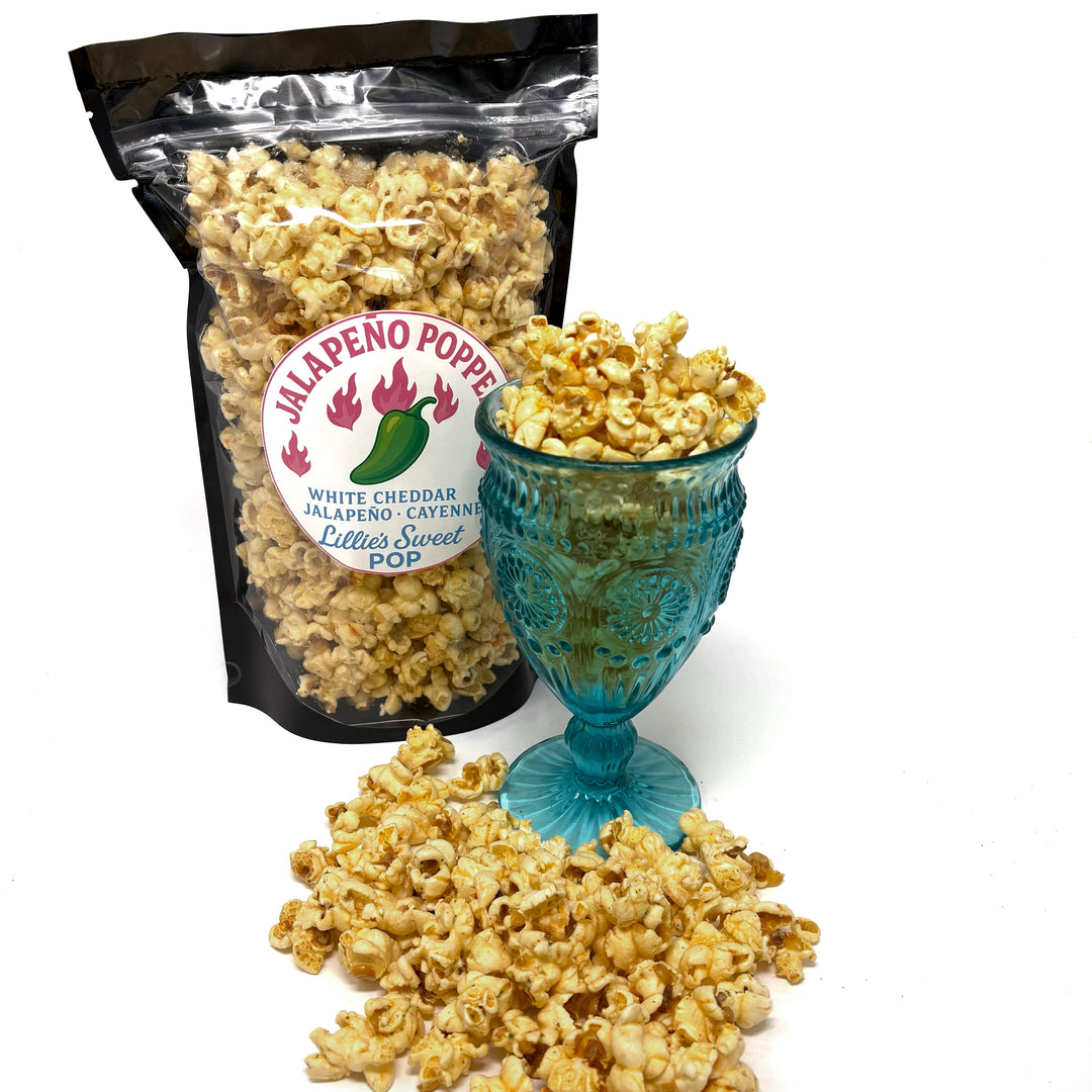 Our Jalapeño Popper Popcorn is an addicting blend of our cheesy white cheddar popcorn with an addition of jalapeño heat and zesty cayenne. 