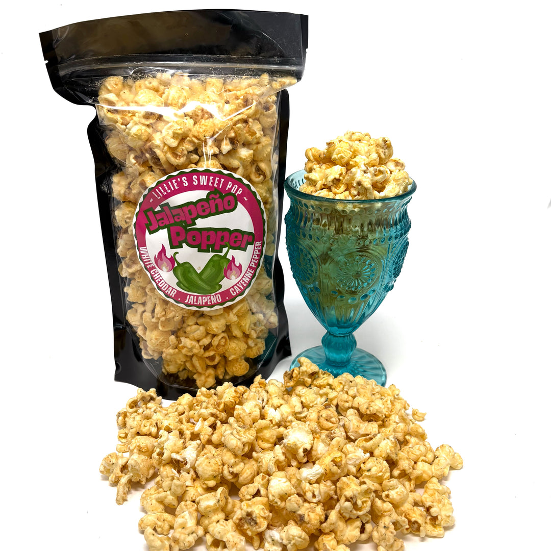 Jalapeño Popper Popcorn includes our white cheddar popcorn mixed with a punchy jalapeño cayenne pepper flavor!