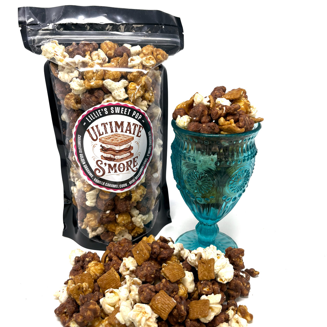 Ultimate S'more popcorn includes our salted vanilla caramel popcorn tossed with gooey s’mores chocolate, golden toasted marshmallows, and crunchy bits of Golden Grahams cooked right in with our caramel.