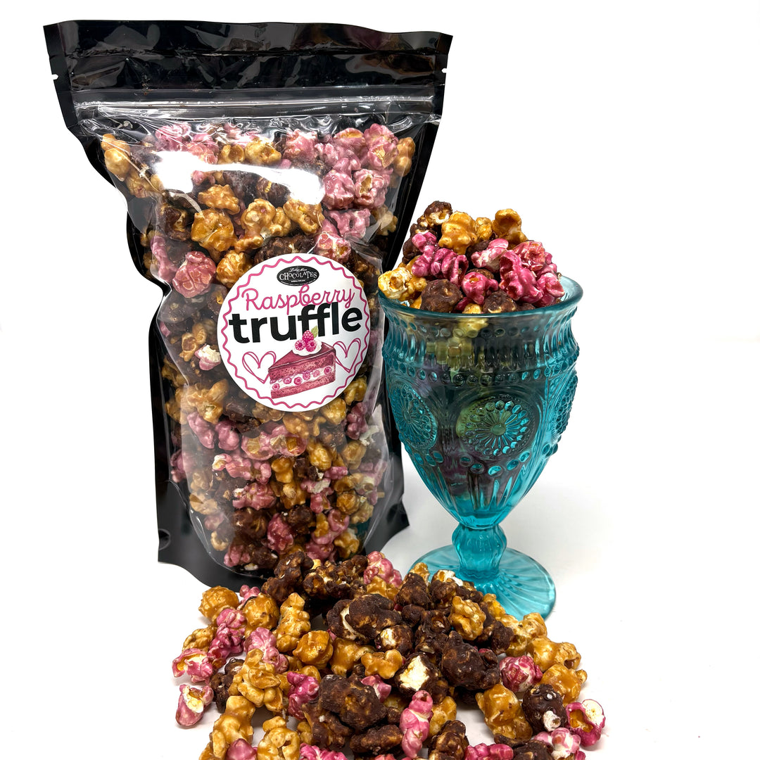 Our Raspberry Truffle Popcorn has a decadent blend of our buttery caramel popcorn, rich raspberry dark chocolate popcorn, and flavorful raspberry popcorn. 