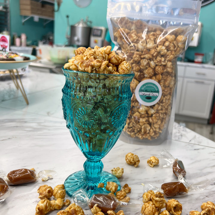 Our Salted Caramel Popcorn shown with our wrapped old-fashioned buttery caramel.