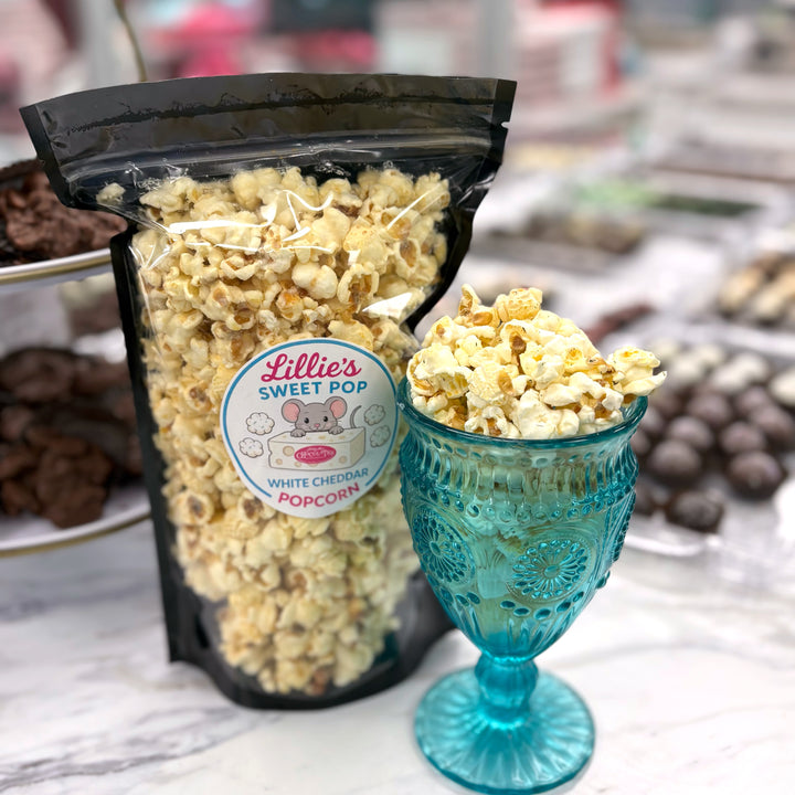 Our White Cheddar Popcorn is coated in a smooth, creamy cheese blend that delivers real, unmistakable white cheddar taste on every kernel.