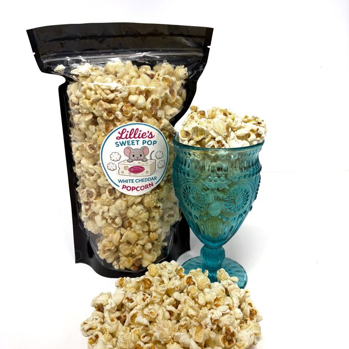 Our White Cheddar Popcorn is coated in a smooth, creamy cheese blend that delivers real, unmistakable white cheddar taste on every kernel.
