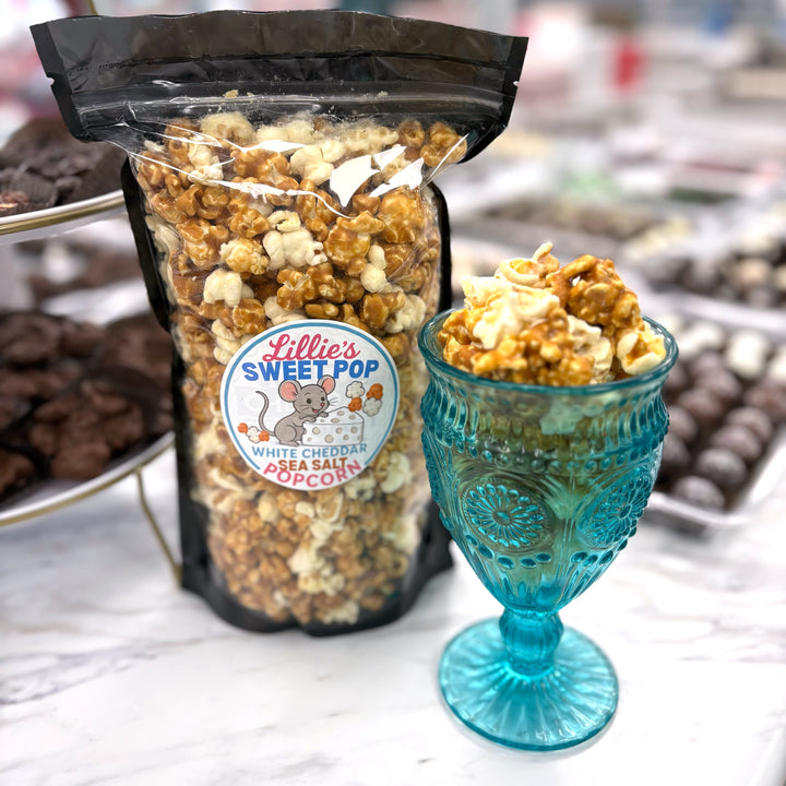 Our White Cheddar Sea Salt Popcorn combines the sharp, creamy taste of real cheddar cheese with the rich, buttery sweetness of our salted caramel popcorn.