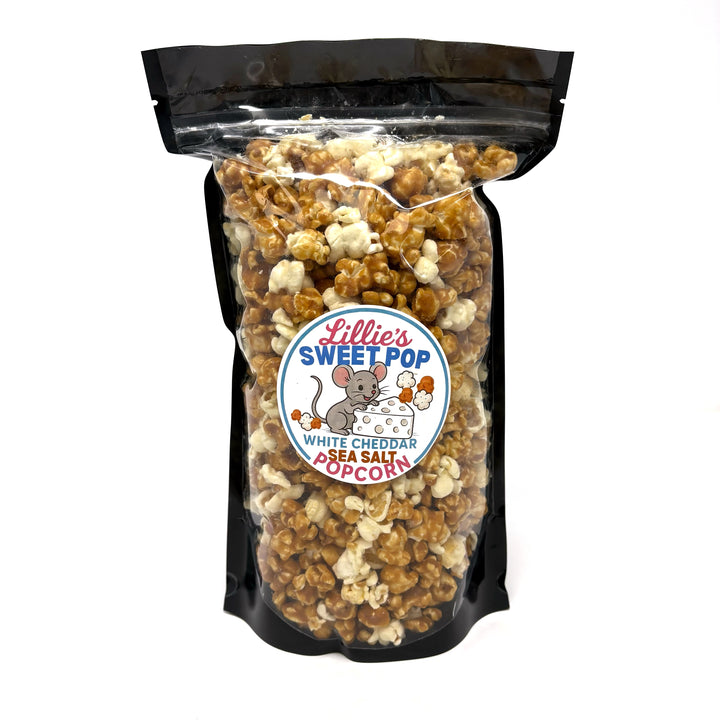 Our White Cheddar Sea Salt Popcorn combines the sharp, creamy taste of real cheddar cheese with the rich, buttery sweetness of our salted caramel popcorn.
