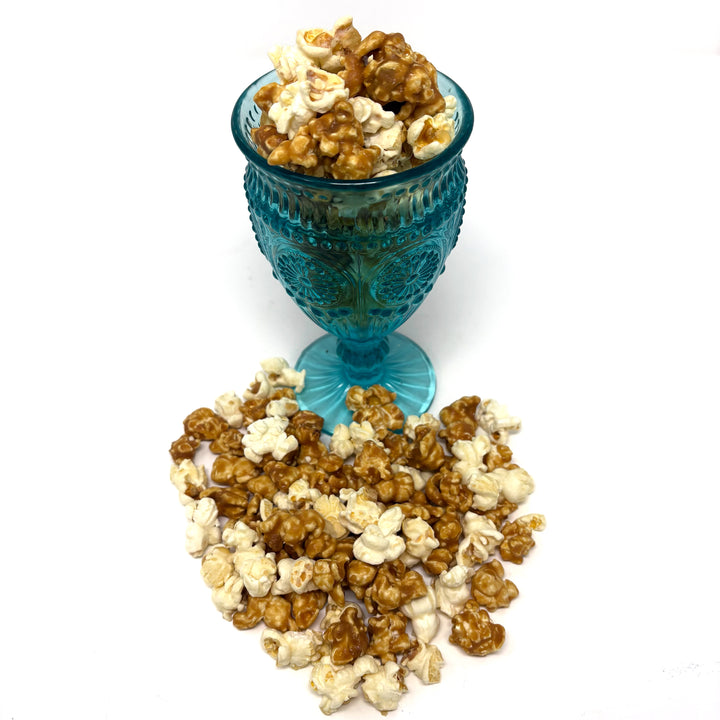Our White Cheddar Sea Salt Popcorn combines the sharp, creamy taste of real cheddar cheese with the rich, buttery sweetness of our salted caramel popcorn.