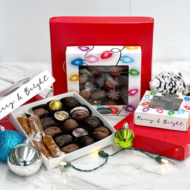 Medium Merry and Bright gift assortment.  Cute assortment with wrapped caramels, truffles, soft center creams sea salt caramel, and a chocolate covered caramel.