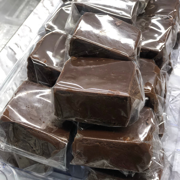 Creamy chocolate fudge individually cut and wrapped into quarter pound pieces.