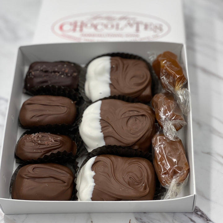 Our medium box filled with a Half pound TorTush, Chocolate covered caramel, sea salt caramel, and wrapped caramels